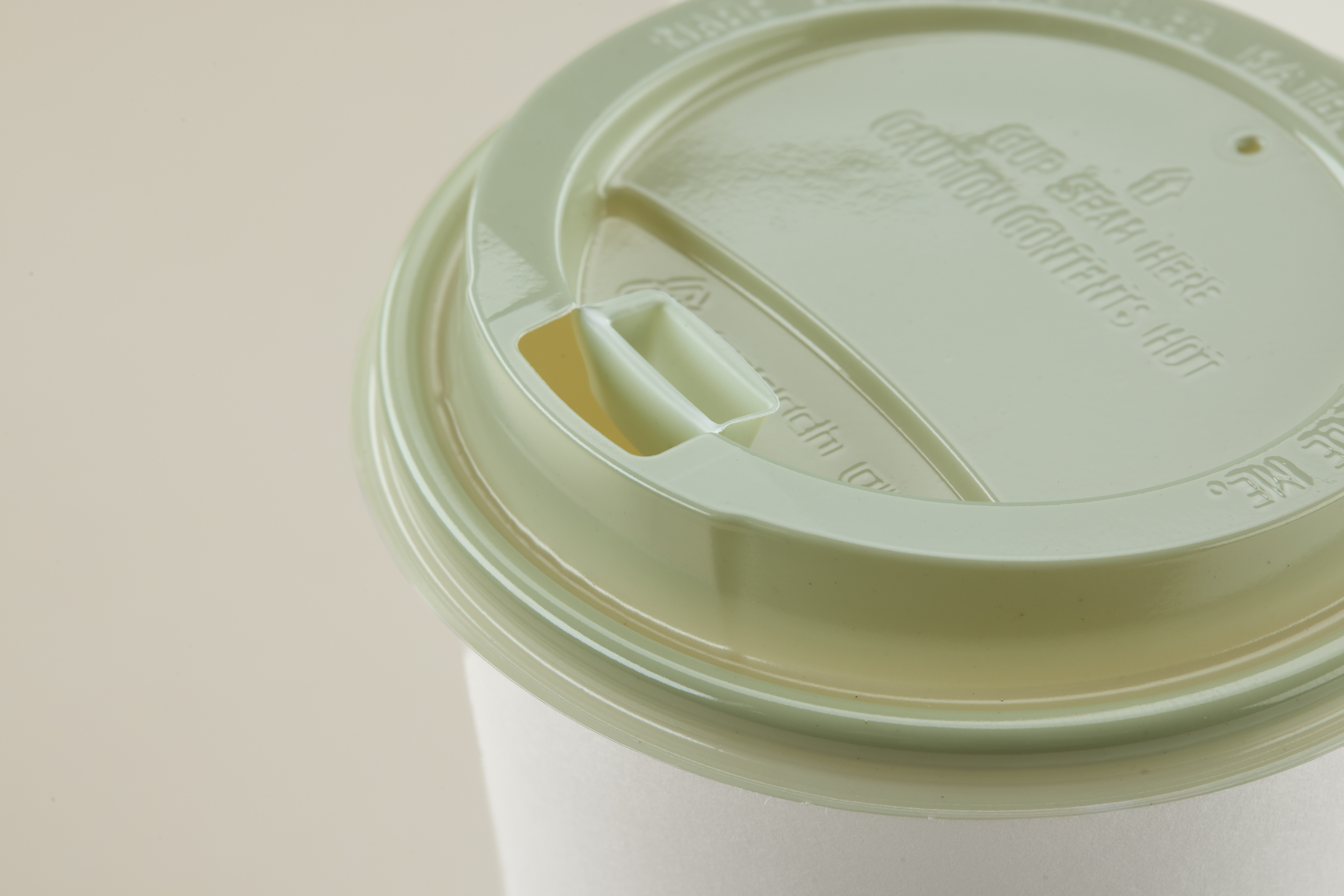 Evolve green PET hot cup lid